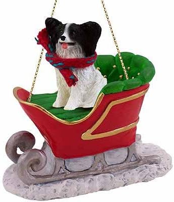 Papillon trineo adorno de Navidad – delicioso. Color blanco y negro