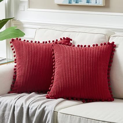 Fancy Homi Paquete de 2 fundas de almohada decorativas de color burdeos de Navidad de 18 x 18 pulgadas con pompones, decoración navideña del hogar, funda de cojín cuadrada de pana suave para sala de